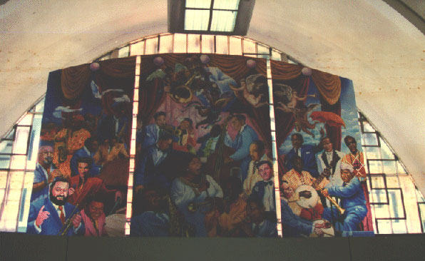 photograph of mural of jazz artists in Louis Armstrong New Orleans International Airport 